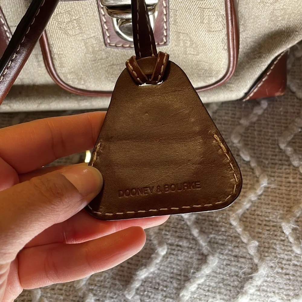 Dooney & Bourke Double Pocket Tote Purse in brown colored monogram. - Picture 4 of 14